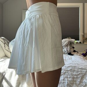 White pleated skirt